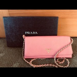 Prada pink wallet on a chain